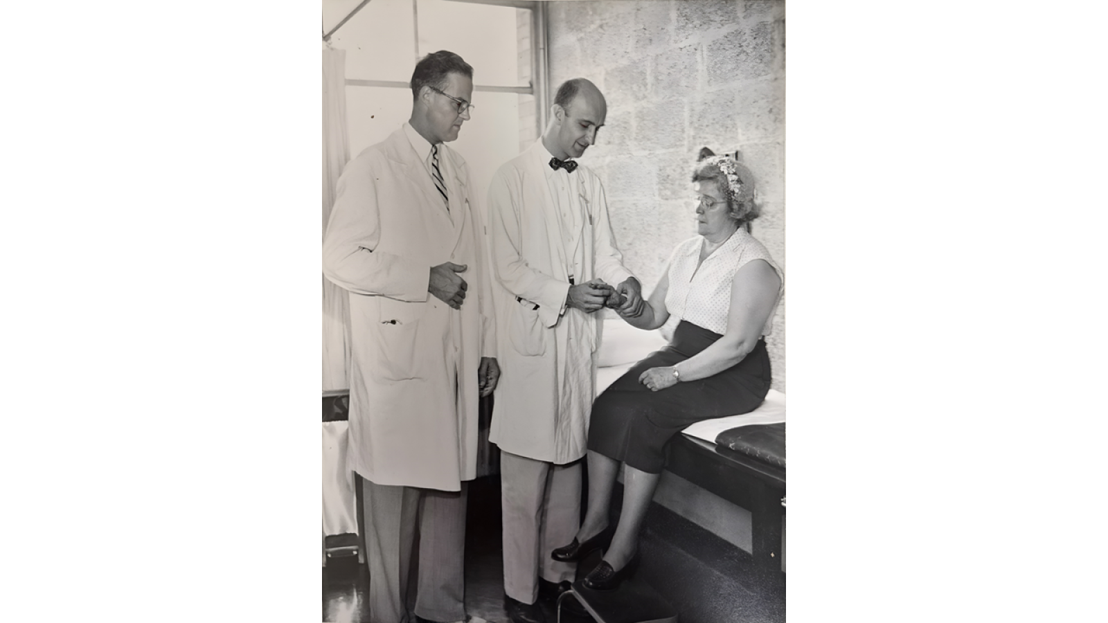 Dr. Hilary H. Holmes (Left) & Dr. Albert W. Grokoest (Right)