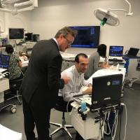 Fellows work in ultrasound room.